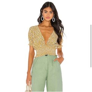 Faithfull the Brand Marguerite Floral Gold Smocked Crop Blouse!